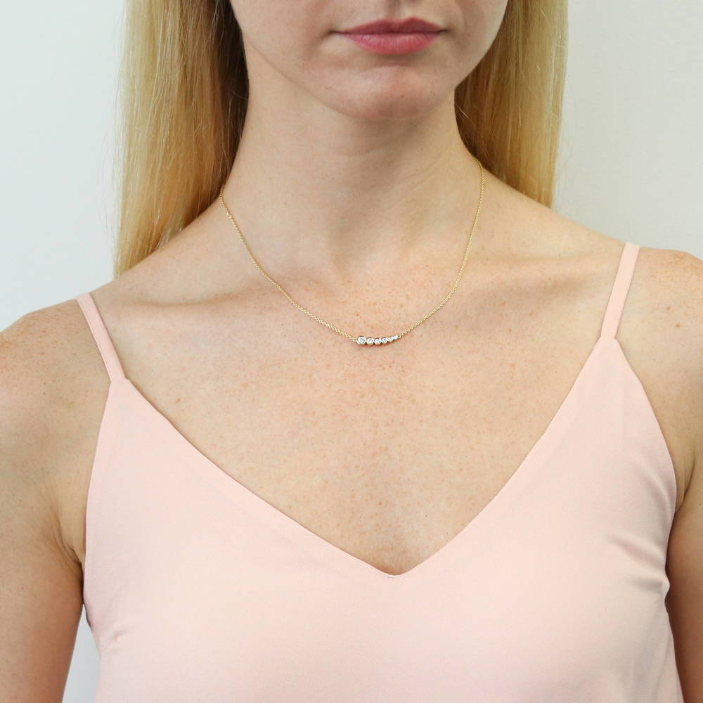 Model wearing Bubble Graduated CZ Necklace in Sterling Silver, Yellow Gold Flashed