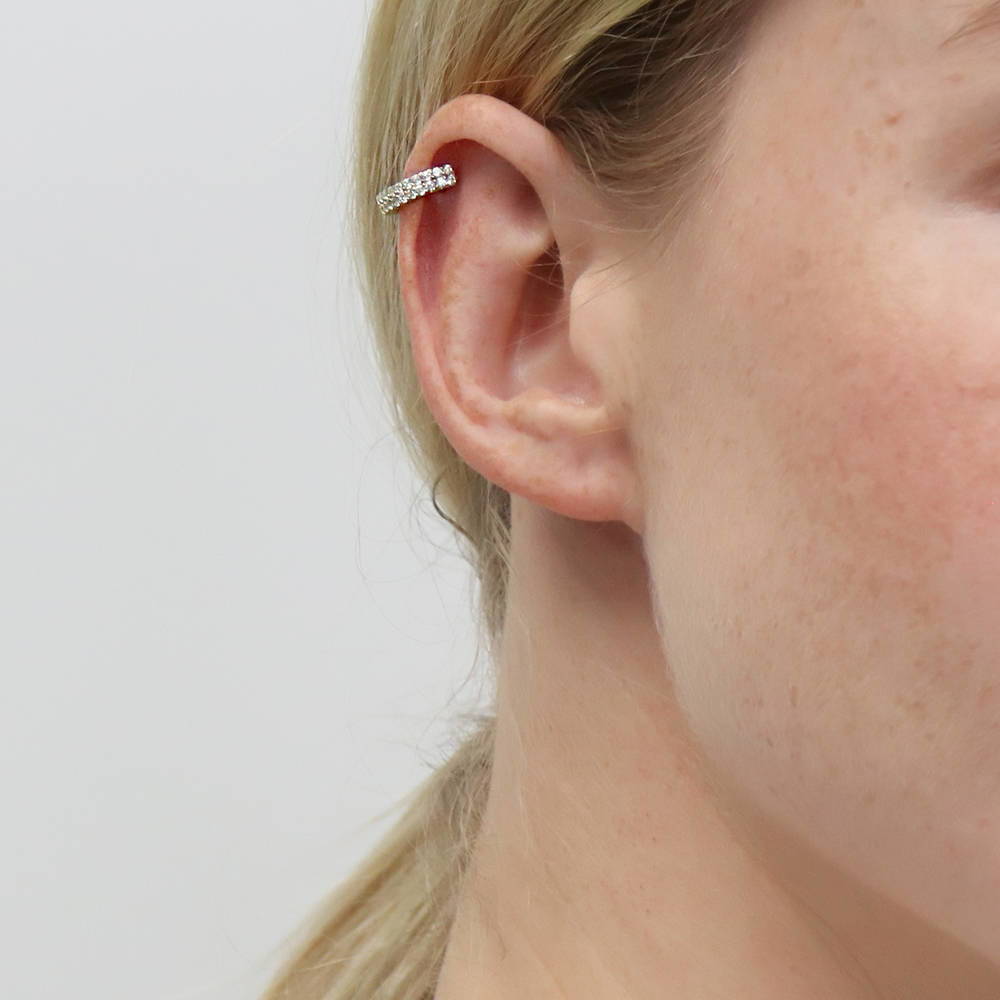 Model wearing CZ Ear Cuff Cartilage Earrings in Sterling Silver, Yellow Gold Flashed