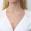 Model wearing Flower CZ Station Necklace in Sterling Silver, Rose Gold Flashed