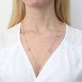 Model wearing Flower CZ Station Necklace in Sterling Silver, Rose Gold Flashed