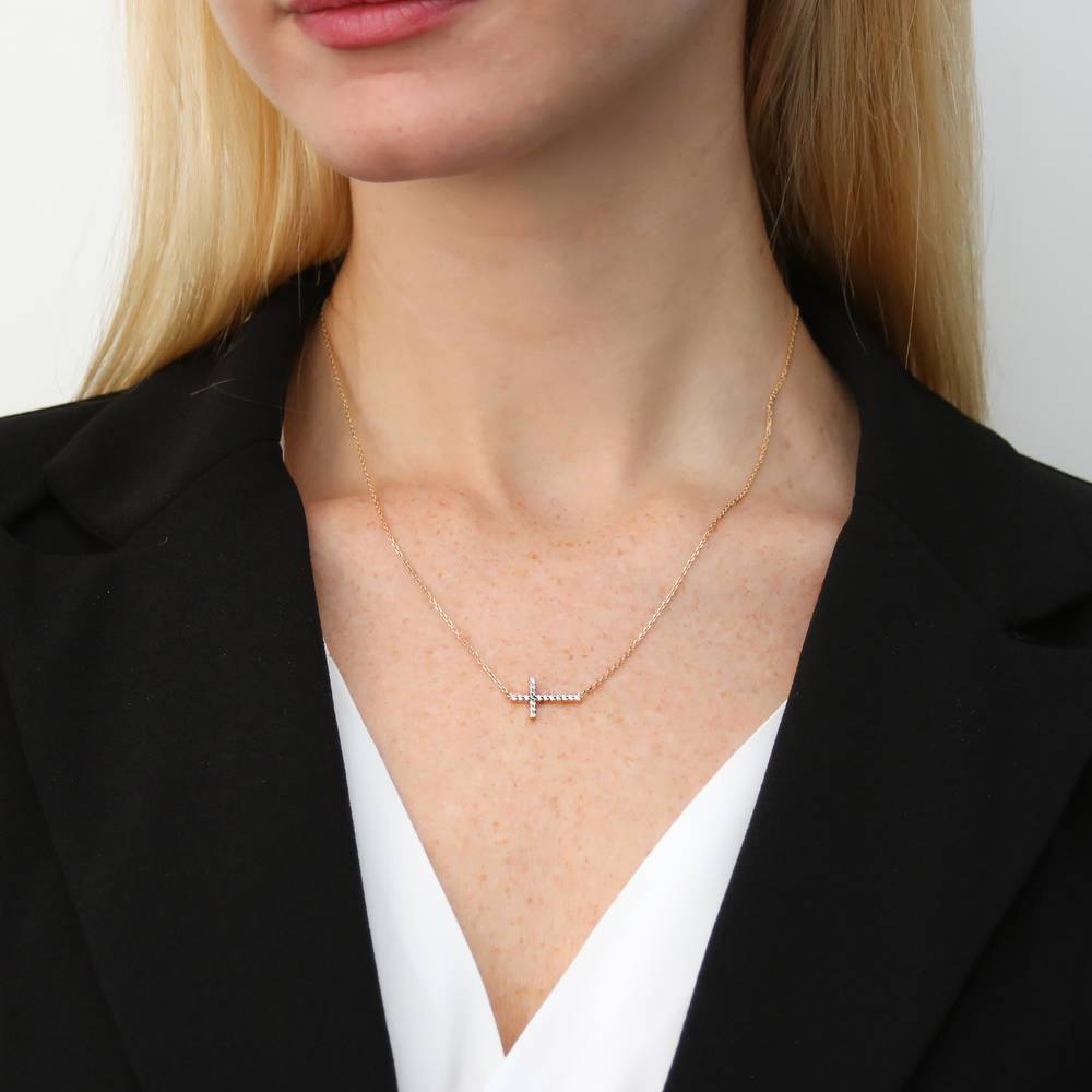 Model wearing Sideways Cross CZ Necklace in Sterling Silver, Yellow Gold Flashed