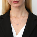 Model wearing Sideways Cross CZ Necklace in Sterling Silver, Rose Gold Flashed