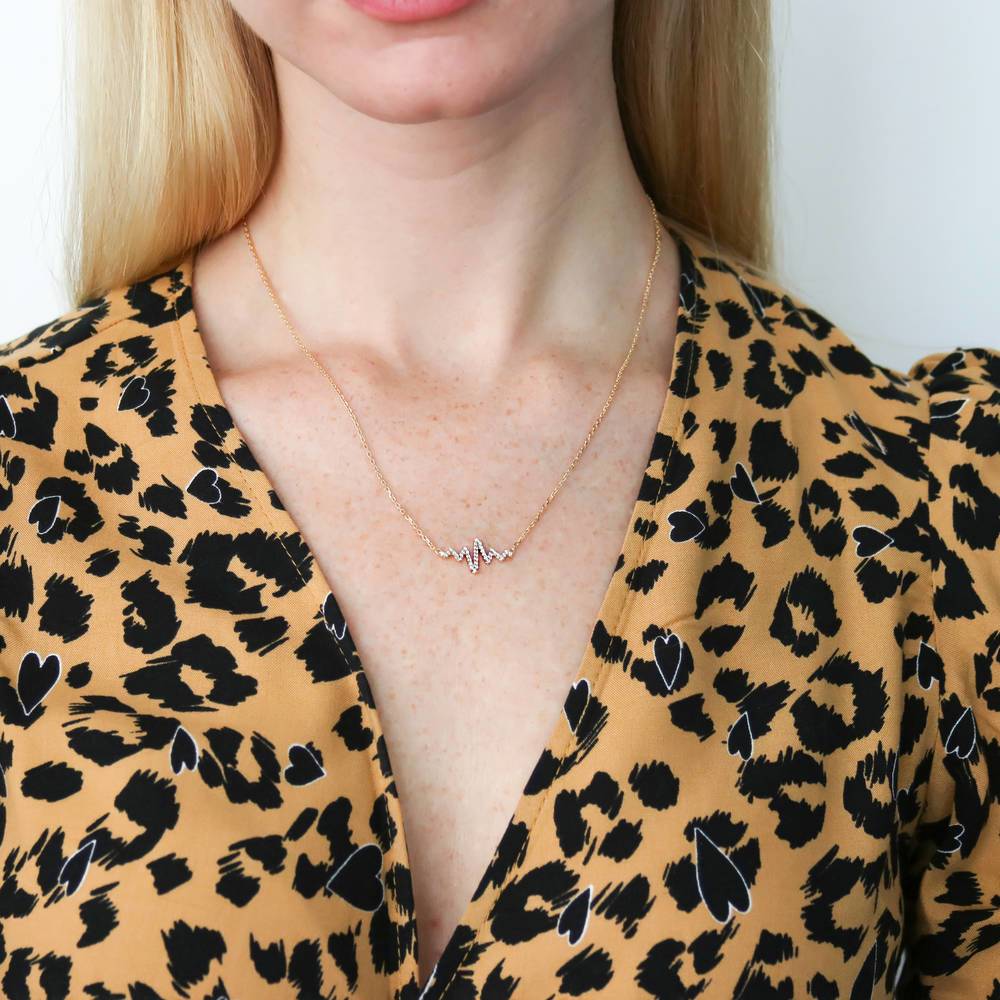 Model wearing Heartbeat CZ Necklace in Sterling Silver, Rose Gold Flashed