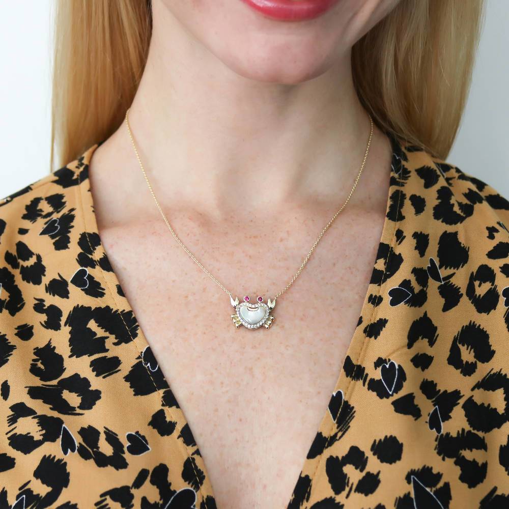 Model wearing Crab Mother Of Pearl Necklace in Sterling Silver, Yellow Gold Flashed