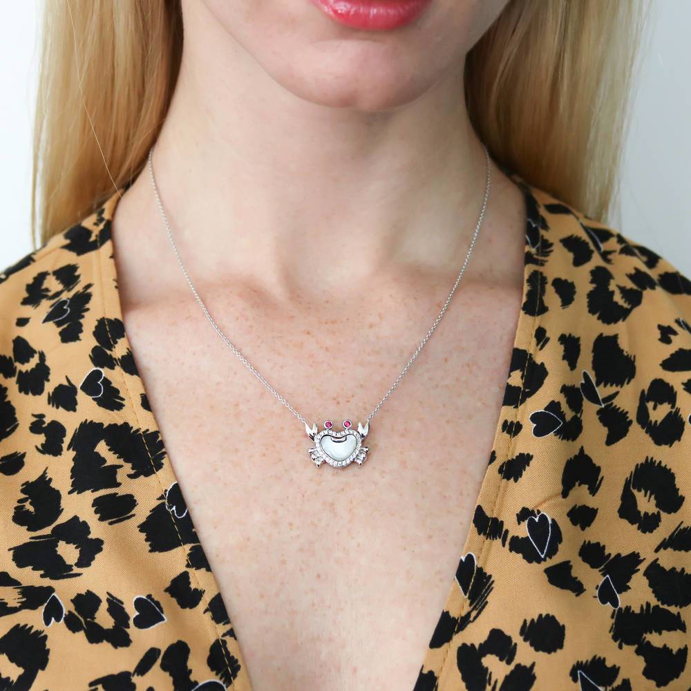 Model wearing Crab Mother Of Pearl Necklace in Sterling Silver, Yellow Gold Flashed