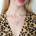 Model wearing Snail Mother Of Pearl Necklace in Sterling Silver, Yellow Gold Flashed