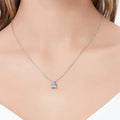 Model wearing Solitaire CZ Necklace in Sterling Silver, Princess Cut / Clear