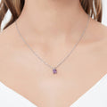 Model wearing Solitaire CZ Necklace in Sterling Silver, Princess Cut / Clear