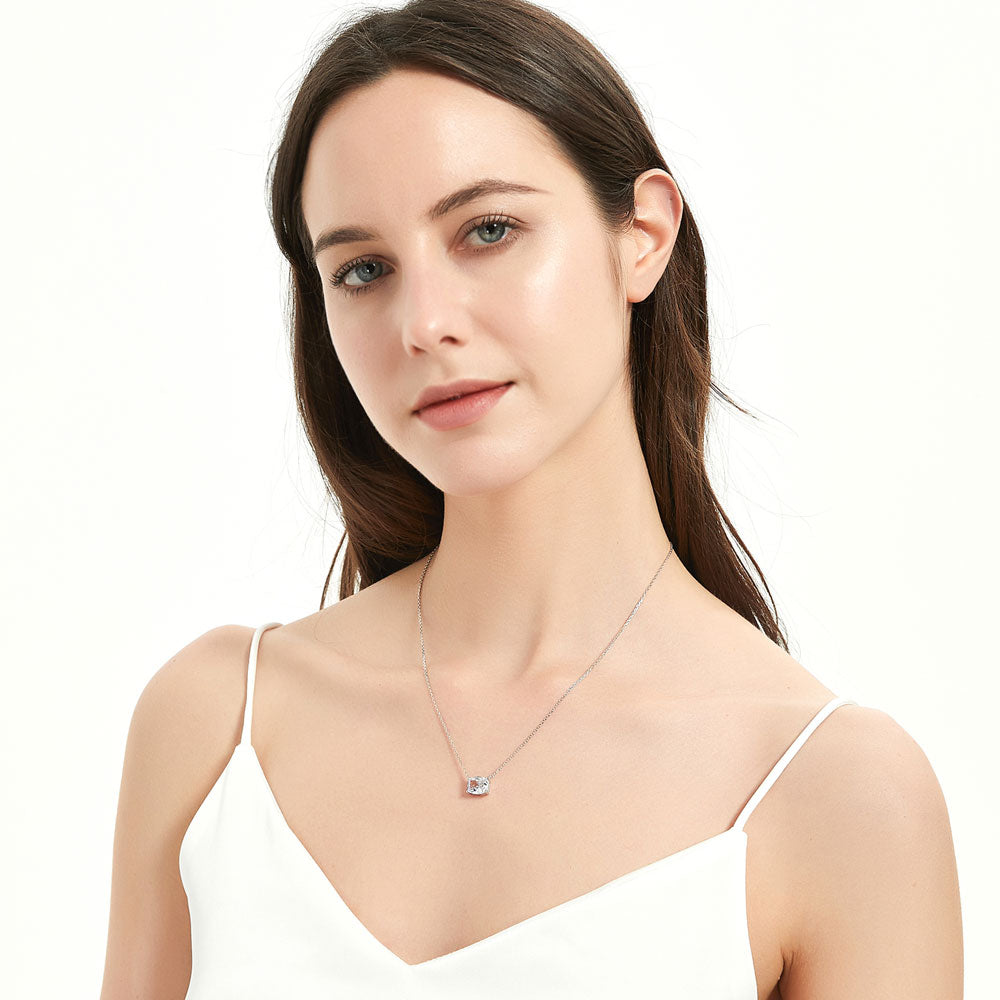 Model wearing Solitaire East-West 3.5ct Radiant CZ Necklace in Sterling Silver, Yellow Gold Flashed