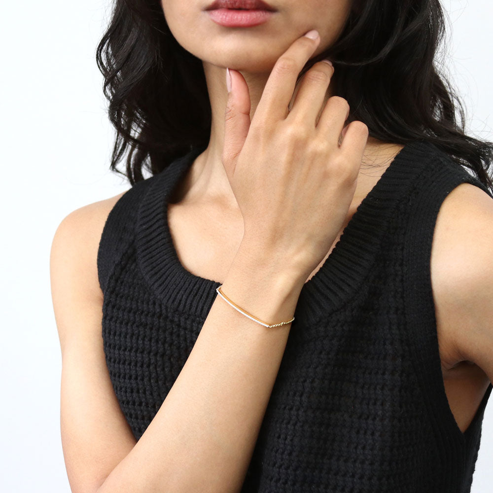 Model wearing Bar CZ Rolo Chain Bracelet in Sterling Silver, Yellow Gold Flashed