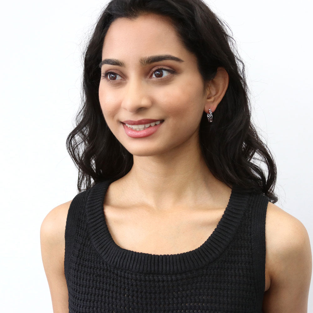 Model wearing Woven Small Hoop Earrings in Sterling Silver 0.7 inch, Yellow Gold Flashed
