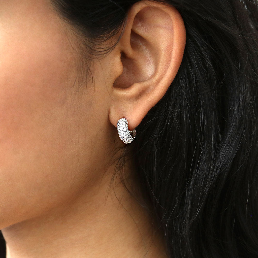 Model wearing Dome CZ Huggie Earrings in Sterling Silver, 2 Pairs, 7 of 13