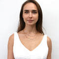 Model wearing Bead Paperclip Link Chain Necklace, 2 Piece, Yellow Gold Flashed