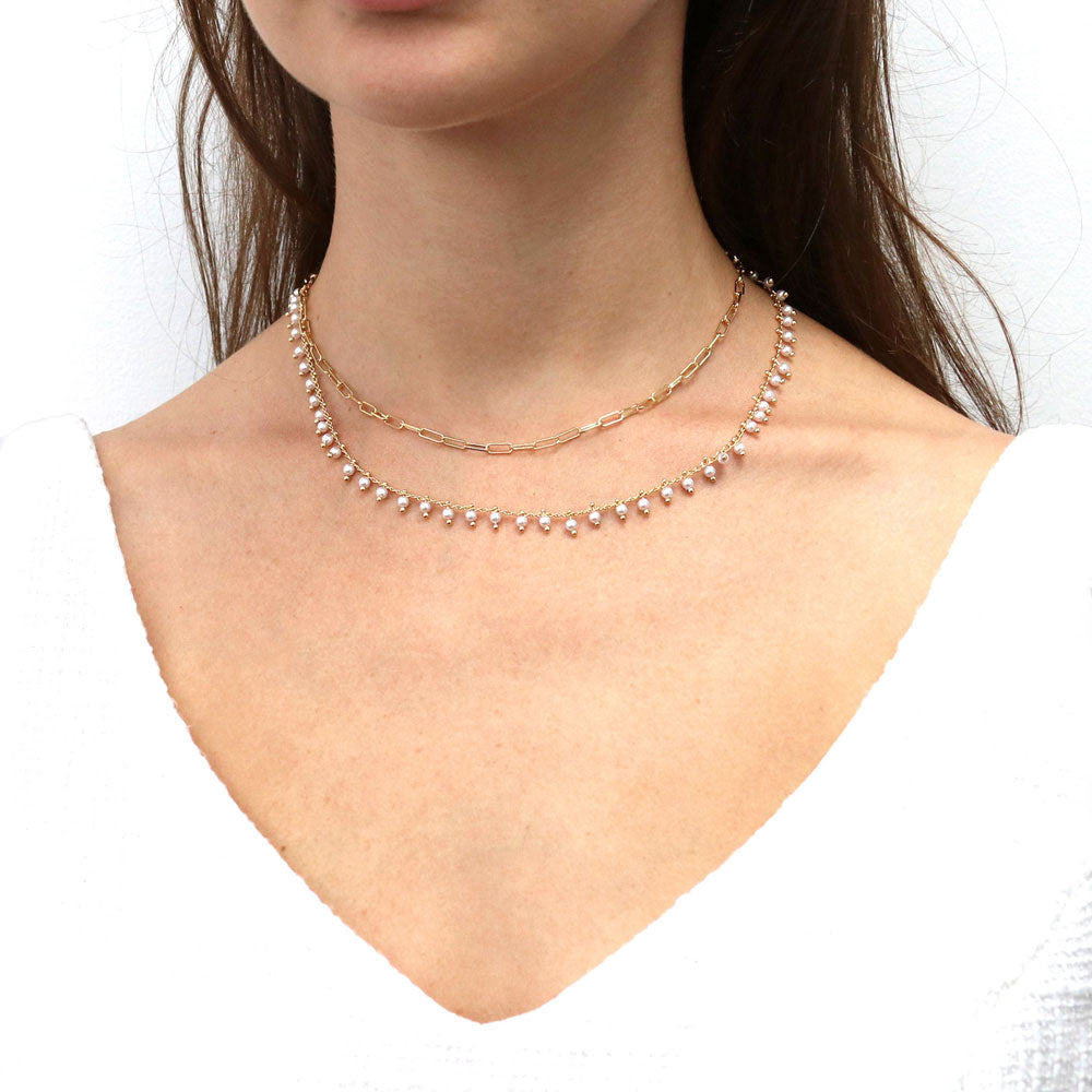 Model wearing Imitation Pearl Station Necklace, Rose Gold Flashed