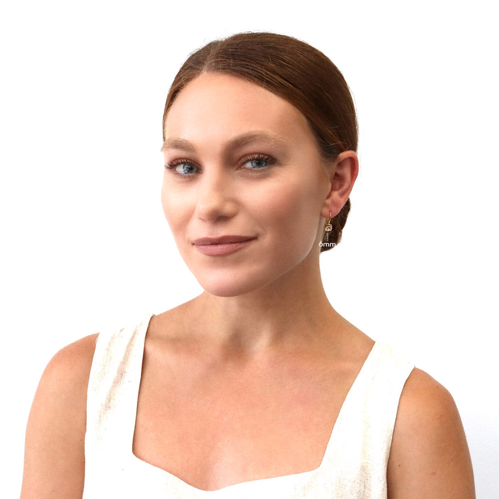 Model wearing Solitaire CZ Leverback Earrings in Gold Flashed Sterling Silver, 5mm