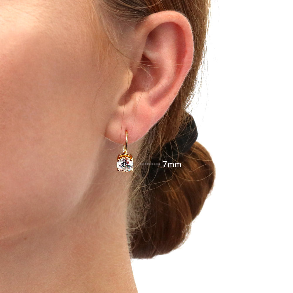 Model wearing Solitaire CZ Leverback Earrings in Gold Flashed Sterling Silver, 5mm