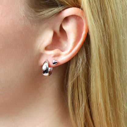 Model Wearing Dome Huggie Earrings, Heart Stud Earrings