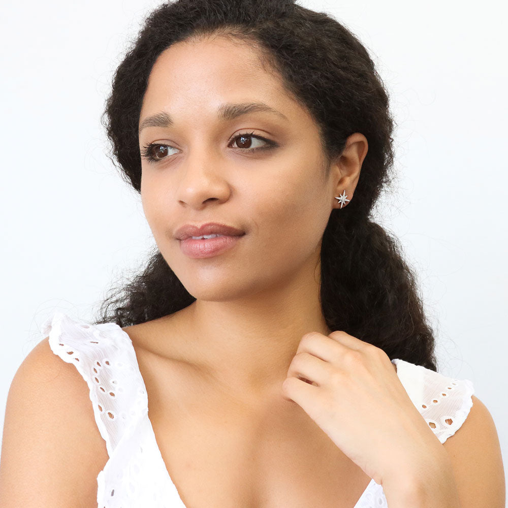 Model wearing North Star CZ Stud Earrings in Sterling Silver, Rhodium Plated
