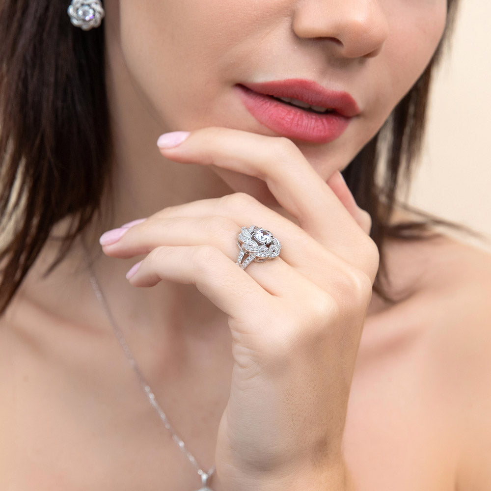 Model wearing Flower Woven Ribbon Wreath CZ Split Shank Ring in Sterling Silver, 6 of 11