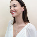 Model wearing Leaf Imitation Pearl Necklace in Sterling Silver, Yellow Gold Flashed