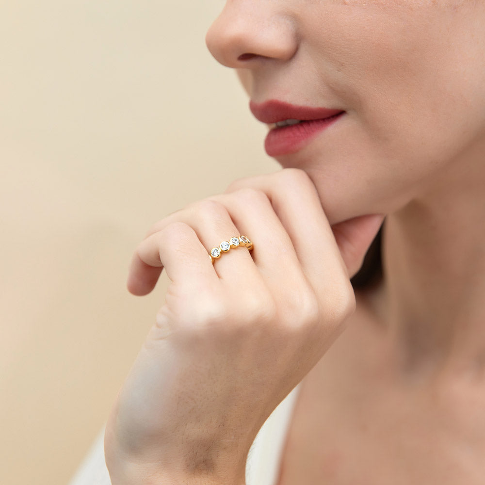 Model wearing Bubble Bezel Set CZ Eternity Ring in Gold Flashed Sterling Silver, 3 of 9