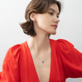 Model wearing Flower Halo CZ Necklace in Sterling Silver, Ruby Color