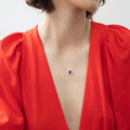 Model wearing Flower Halo CZ Necklace in Sterling Silver, Ruby Color