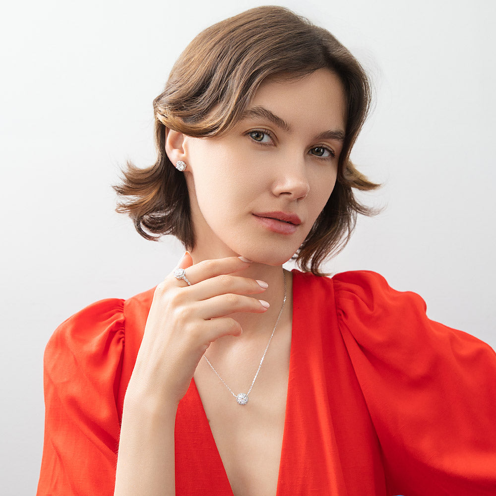 Model wearing Flower Halo CZ Necklace and Earrings Set in Sterling Silver, 2 of 14