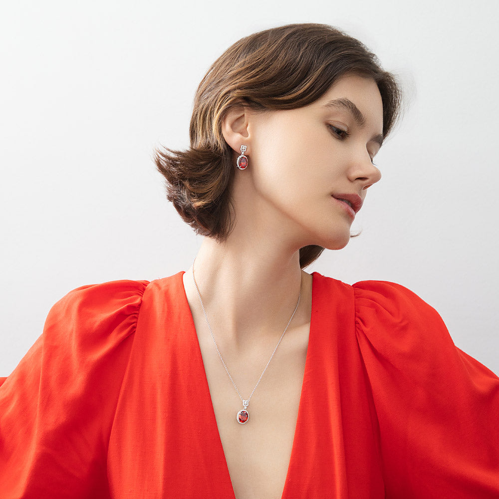 Model wearing Halo Clover Oval CZ Necklace in Sterling Silver, Red Color