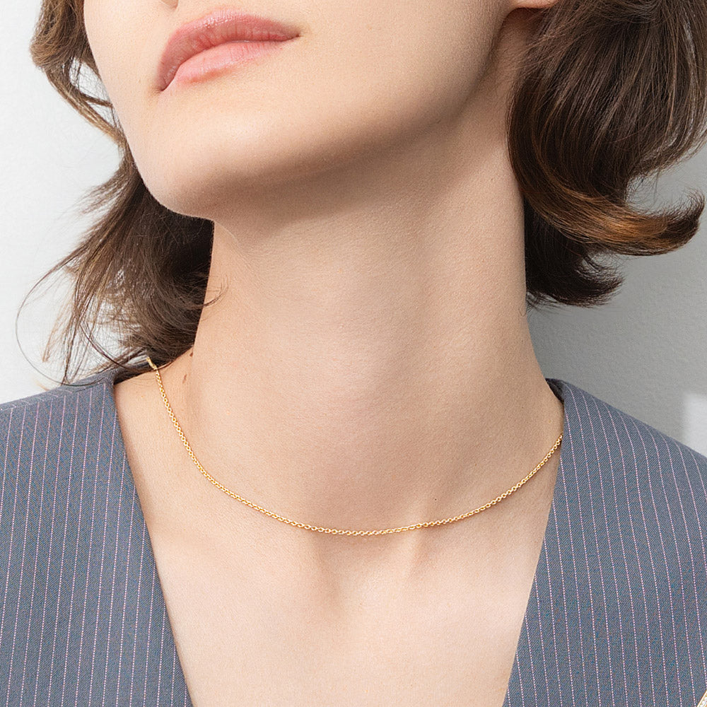 Model wearing Adjustable Slider Rolo Chain Necklace in Sterling Silver, Yellow Gold Flashed