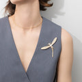 Model wearing Dragonfly Button Cultured Pearl Pin in Sterling Silver, Yellow Gold Flashed