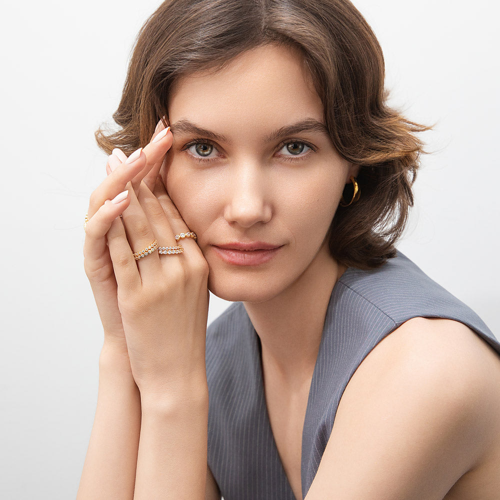 Model wearing Pave CZ Eternity Ring in Gold Flashed Sterling Silver, 9 of 10