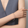 Model wearing Flexible CZ Bangle in Sterling Silver, 1.75mm / 6.5 inch