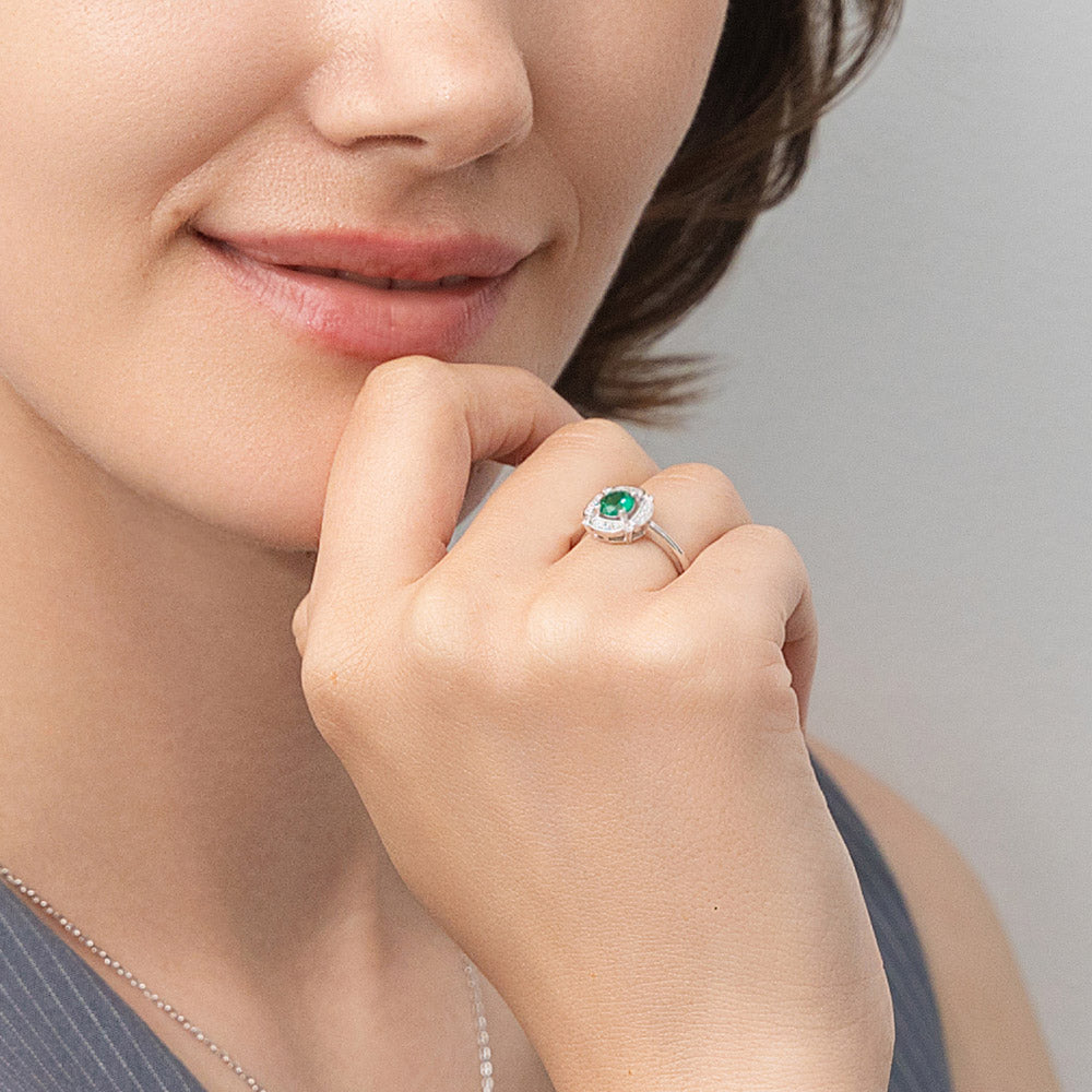 Model wearing Halo Flower Green CZ Ring in Sterling Silver, 3 of 9