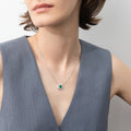 Model wearing Flower Halo CZ Necklace in Sterling Silver, Emerald Color