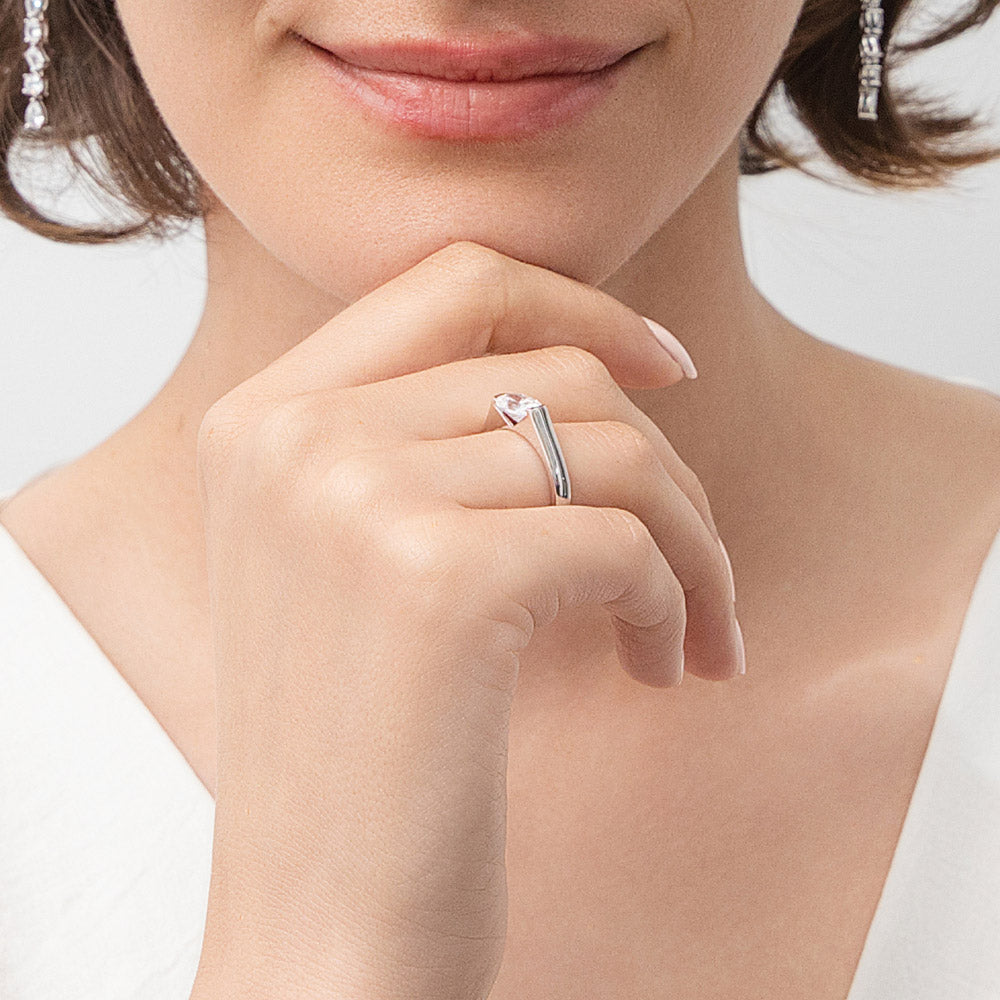 Model wearing Solitaire 1.2ct Half Bezel Set Oval CZ Ring in Sterling Silver, 3 of 8