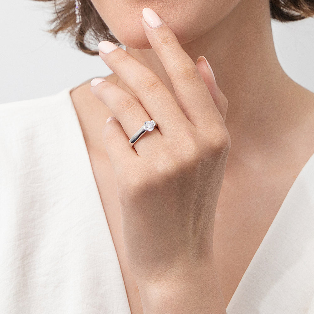 Model wearing Solitaire 0.8ct Bezel CZ Ring in Sterling Silver, 6 of 11