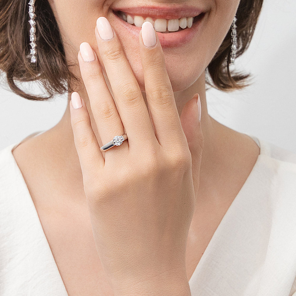 Model wearing Solitaire 0.8ct Bezel CZ Ring in Sterling Silver, 2 of 10