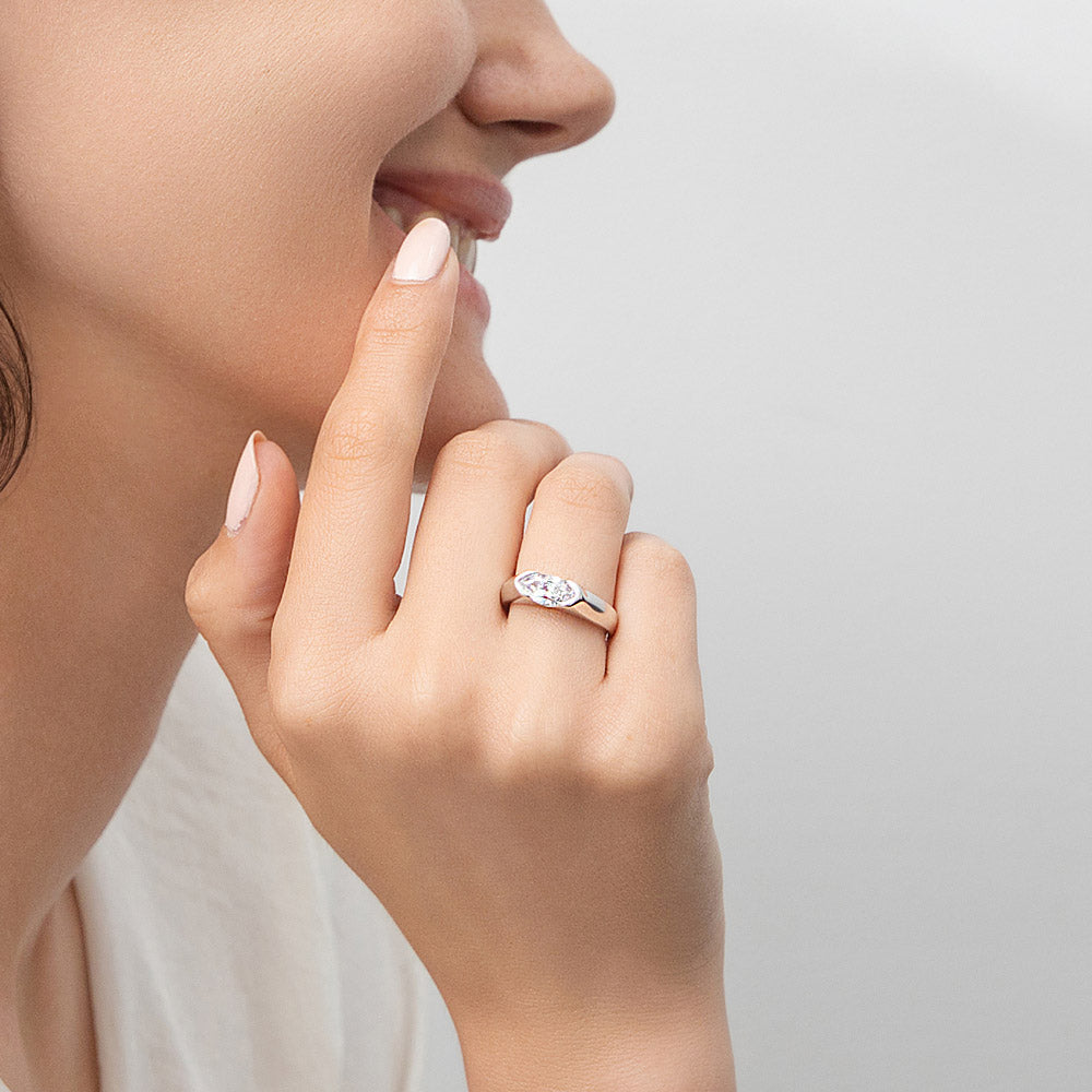 Model wearing East-West Solitaire 1ct Bezel CZ Ring in Sterling Silver, 2 of 10