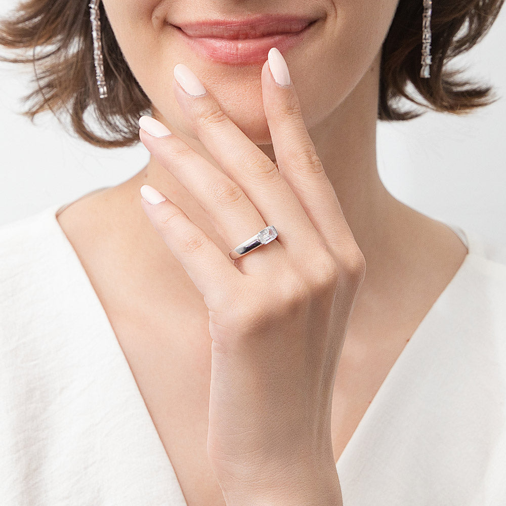 Model wearing East-West Solitaire 1ct Bezel CZ Ring in Sterling Silver, 7 of 11