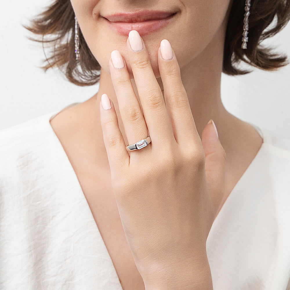 Model wearing East-West Solitaire 1ct Bezel CZ Ring in Sterling Silver, 6 of 11