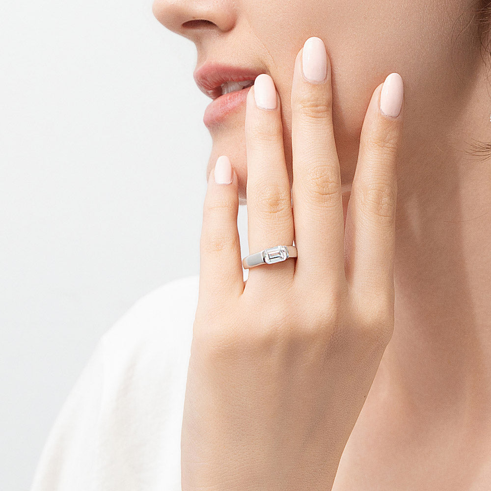 Model wearing East-West Solitaire 1ct Bezel CZ Ring in Sterling Silver, 2 of 12