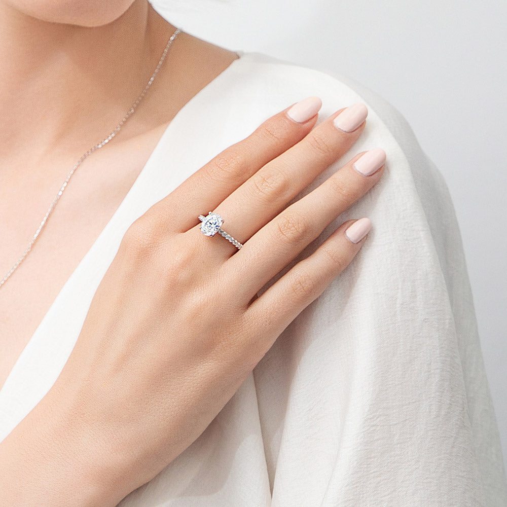 Model wearing Solitaire 1.8ct Oval CZ Ring in Sterling Silver, 7 of 11