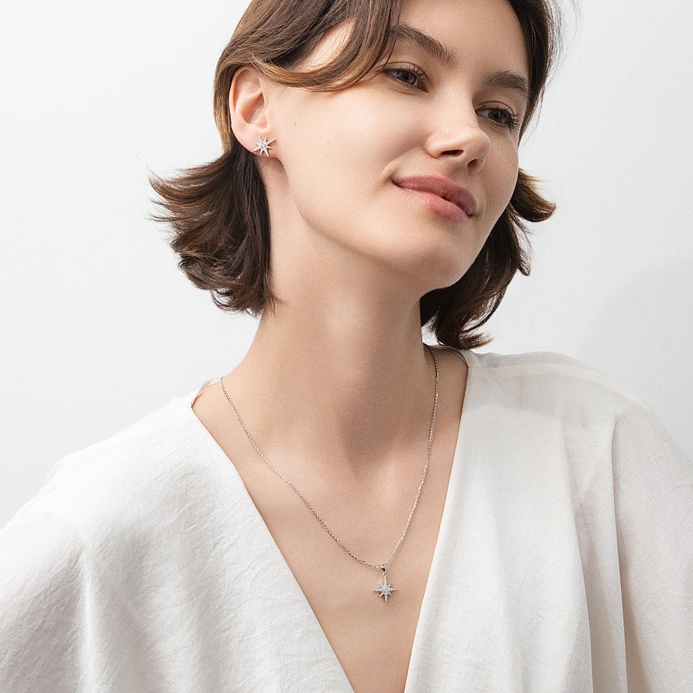 Model wearing North Star CZ Stud Earrings in Sterling Silver, Rhodium Plated