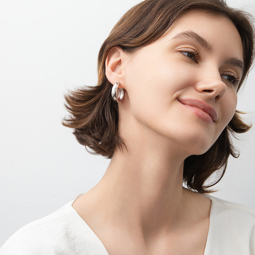 Model wearing Dome Hoop Earrings in Sterling Silver, 2 Pairs, Rhodium Plated