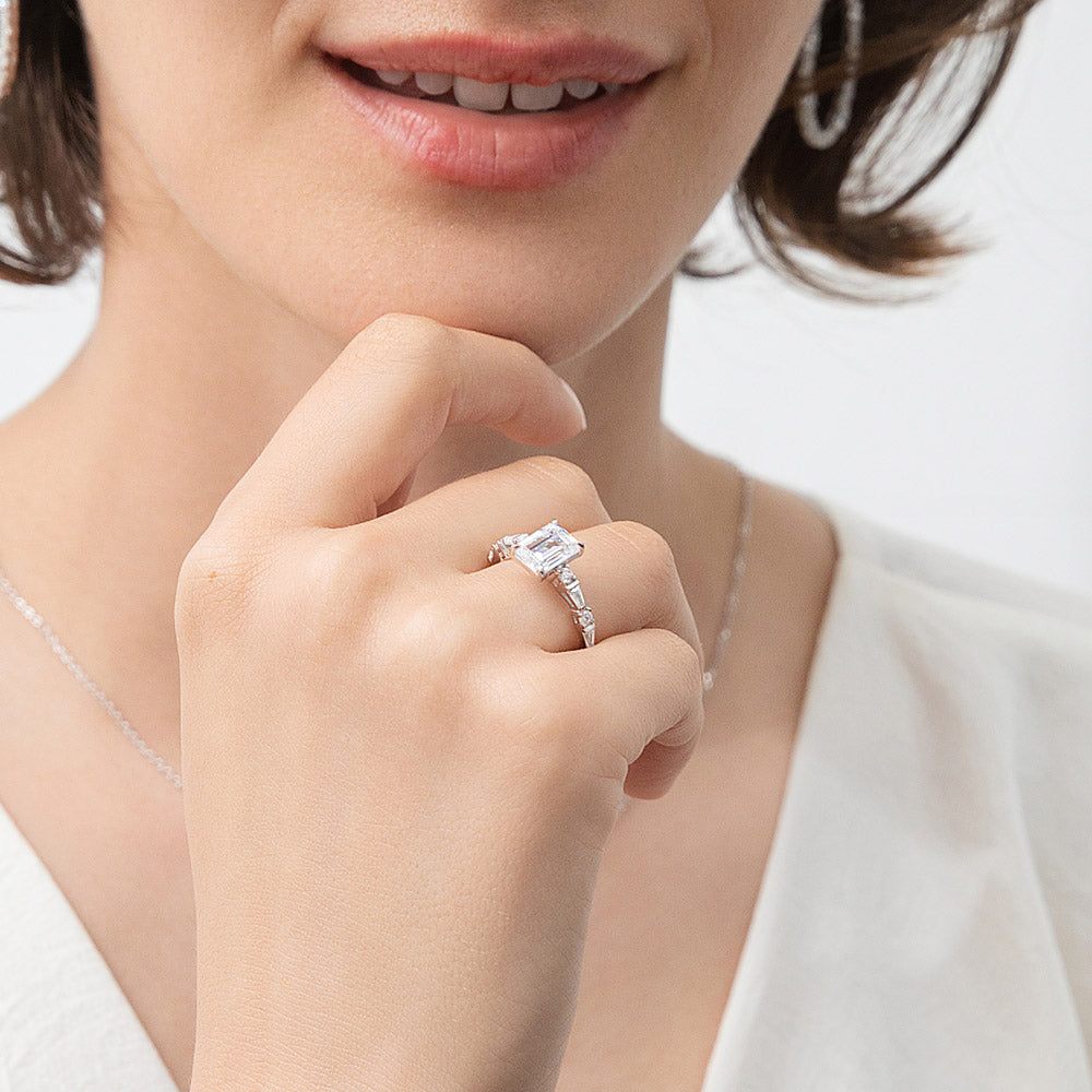 Model wearing Solitaire 1.7ct Step Emerald Cut CZ Ring Set in Sterling Silver, 10 of 12