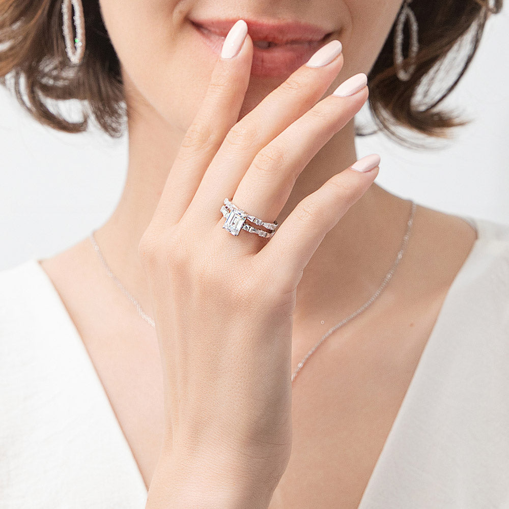 Model wearing Solitaire 1.7ct Step Emerald Cut CZ Ring Set in Sterling Silver, 6 of 12