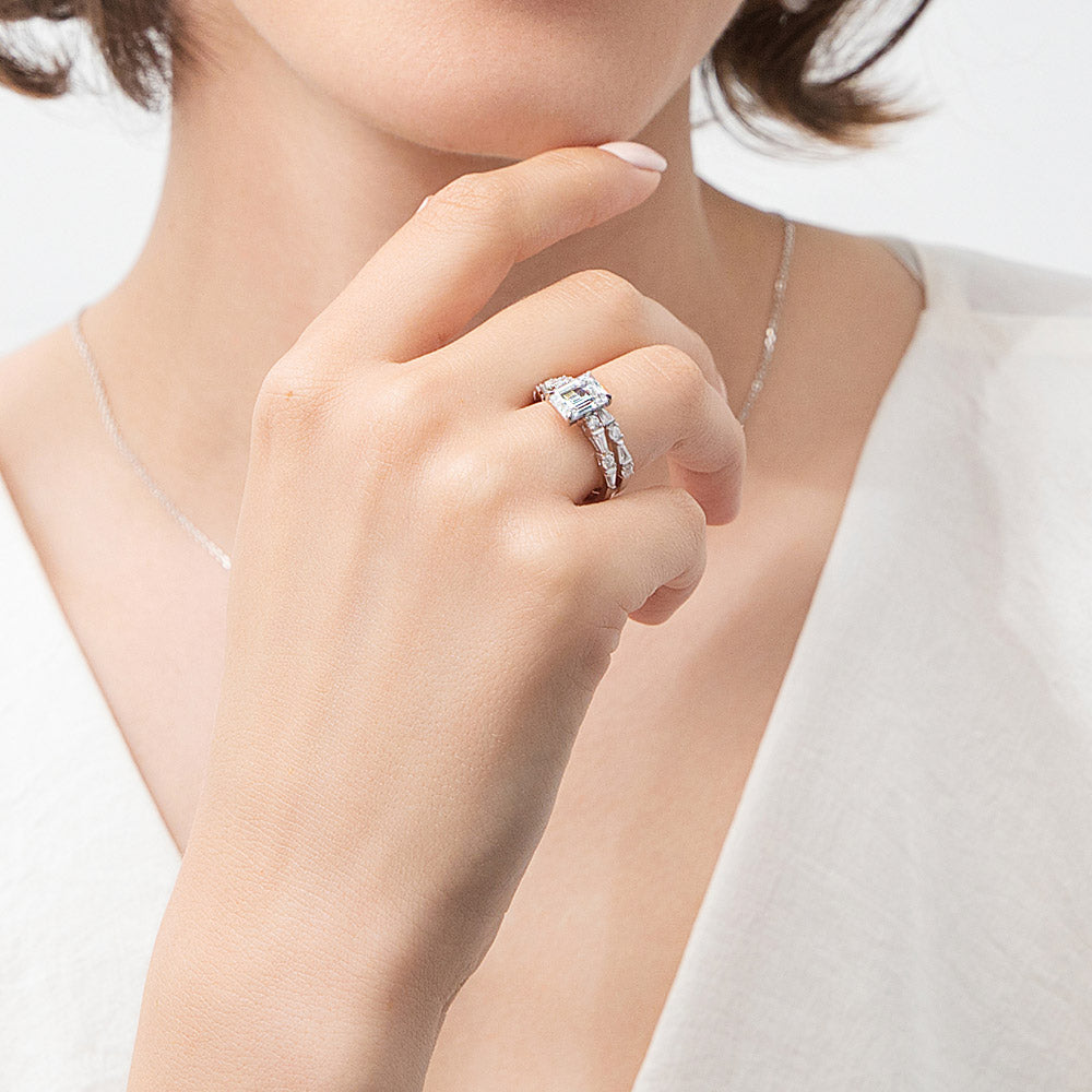 Model wearing Solitaire 1.7ct Step Emerald Cut CZ Ring Set in Sterling Silver, 3 of 12