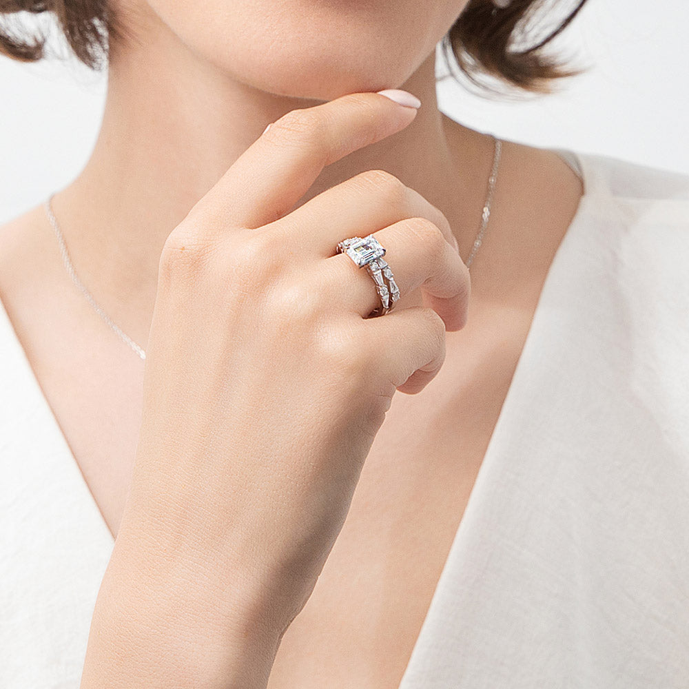 Model wearing Solitaire Art Deco Emerald Cut CZ Ring Set in Sterling Silver, 3 of 12