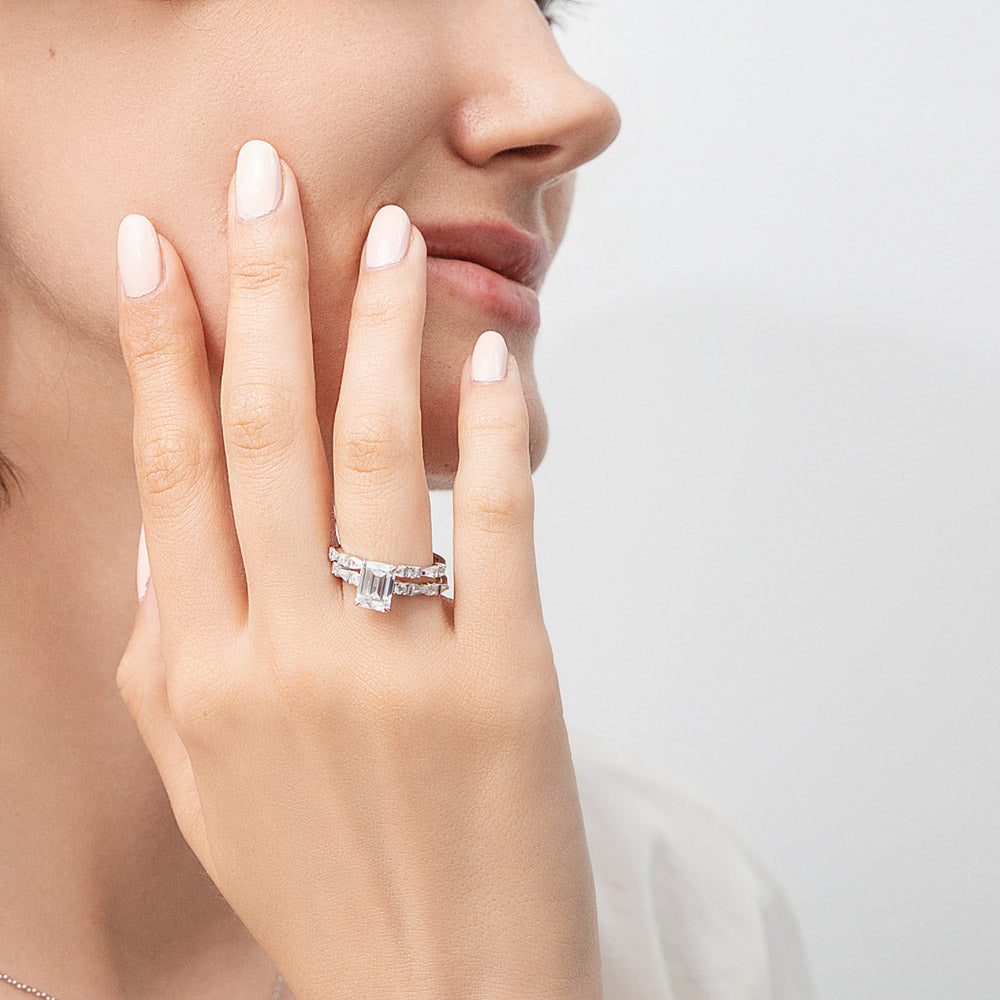 Model wearing Solitaire 1.7ct Step Emerald Cut CZ Ring Set in Sterling Silver, 2 of 12